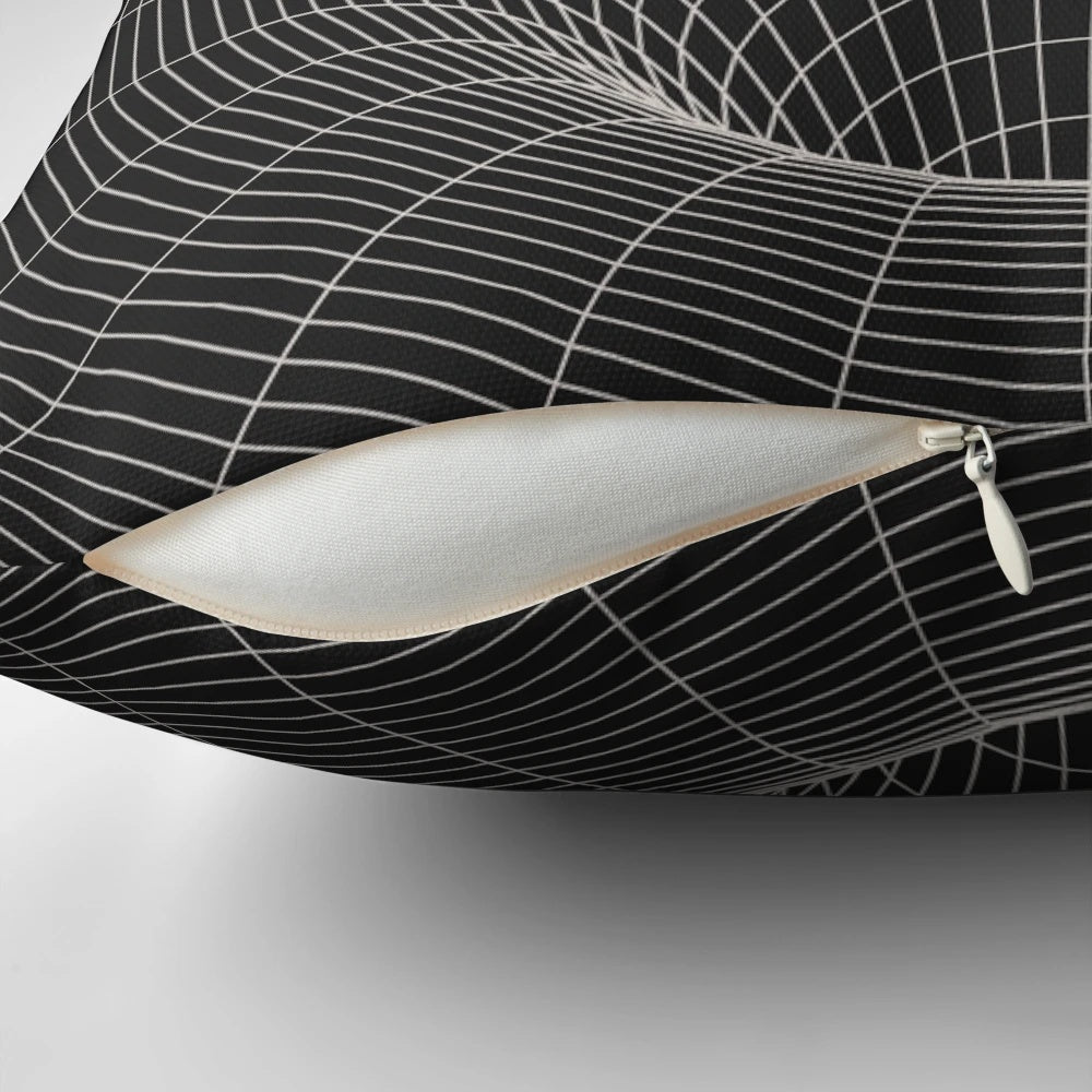 Decorative space-themed pillow with a black hole and wormhole design