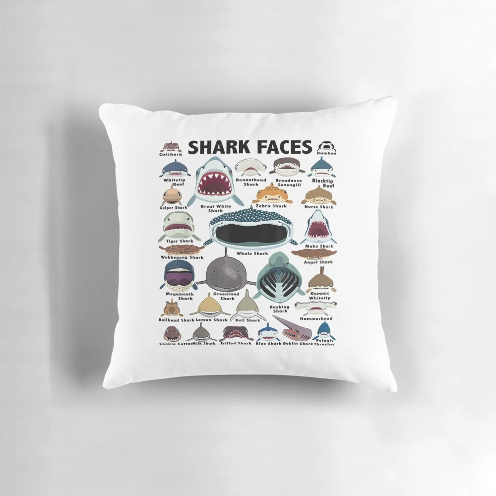 Soft, plush pillow featuring a vibrant shark face and heart design, perfect for shark lovers.