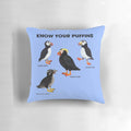 A colorful and informative pillow featuring illustrations of different puffin species