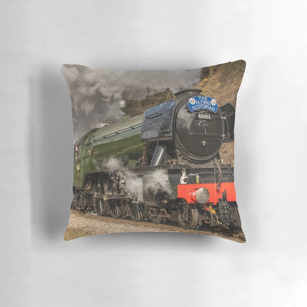 The iconic green steam locomotive, the Flying Scotsman, a famous British train known for its speed and record-breaking achievements.