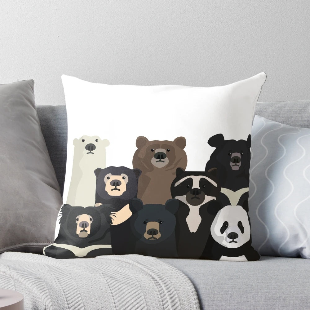 A cozy pillow featuring a collection of bear species from around the world, including polar bears, pandas, grizzlies, and more.