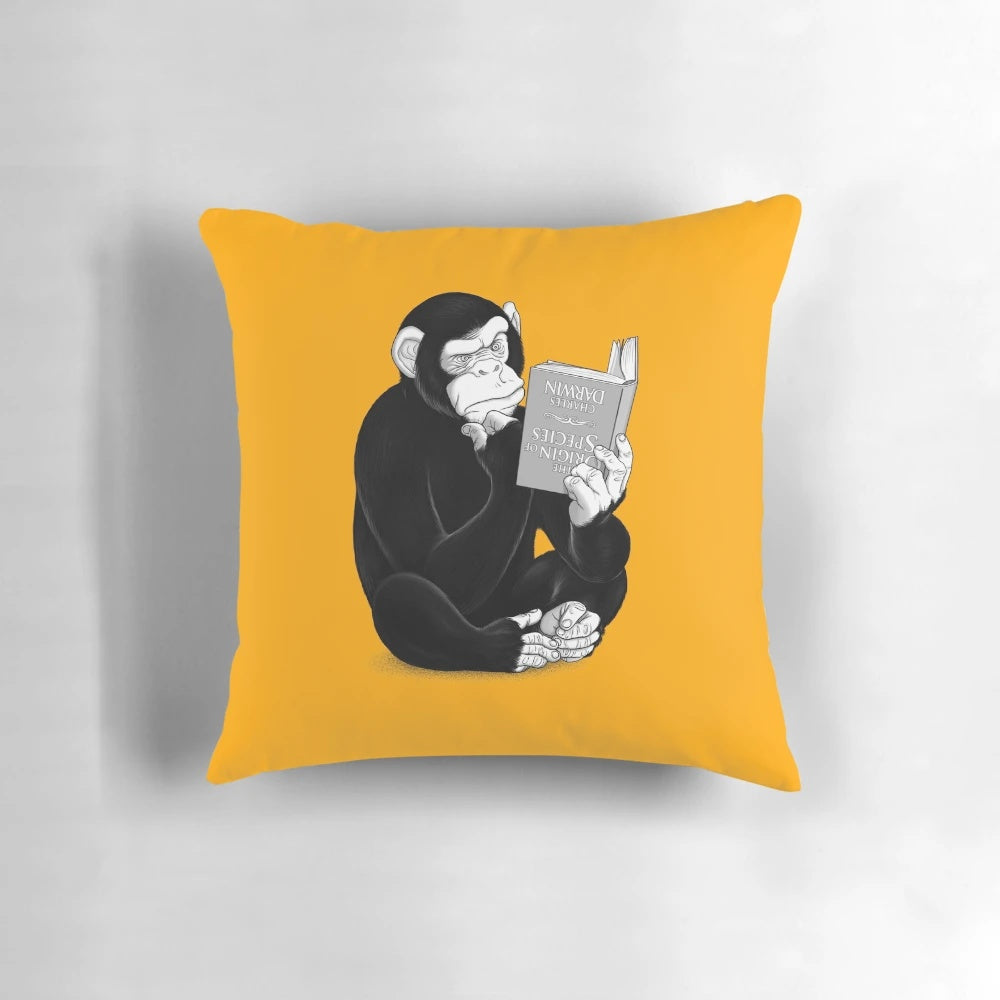 Soft and cozy pillow featuring the classic book "On the Origin of Species" by Charles Darwin, showcasing the evolution of apes and chimpanzees.