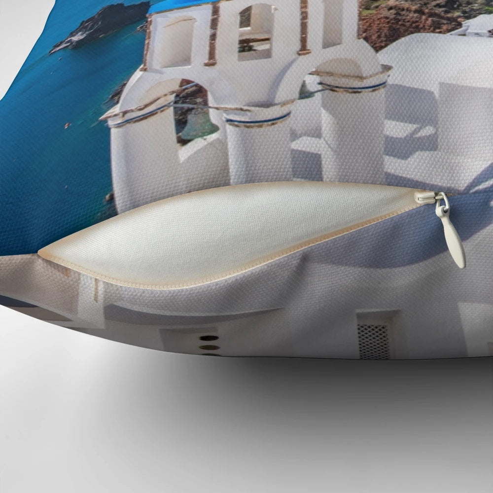 Santorini Greece Pillow featuring a stunning view of the iconic white-washed buildings and blue-domed churches