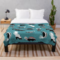 Plush blanket featuring various skunk species from the Mephitidae family