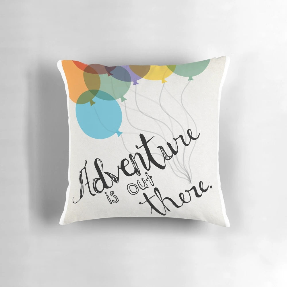 Decorative throw pillow featuring the "Adventure is Out There" quote from the Disney Pixar movie "Up