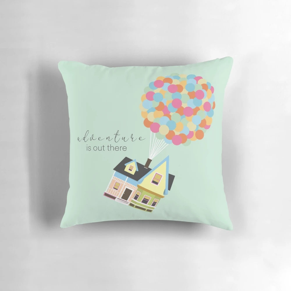 Whimsical "Up" inspired pillow featuring colorful balloons, perfect for wanderlust and Pixar fans