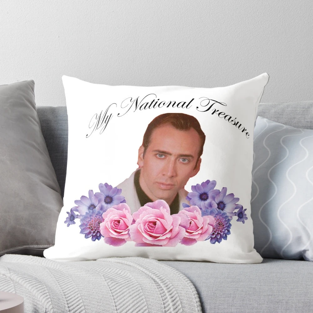 A stylish floral pillow featuring the iconic face of Nicholas Cage, the star of National Treasure.