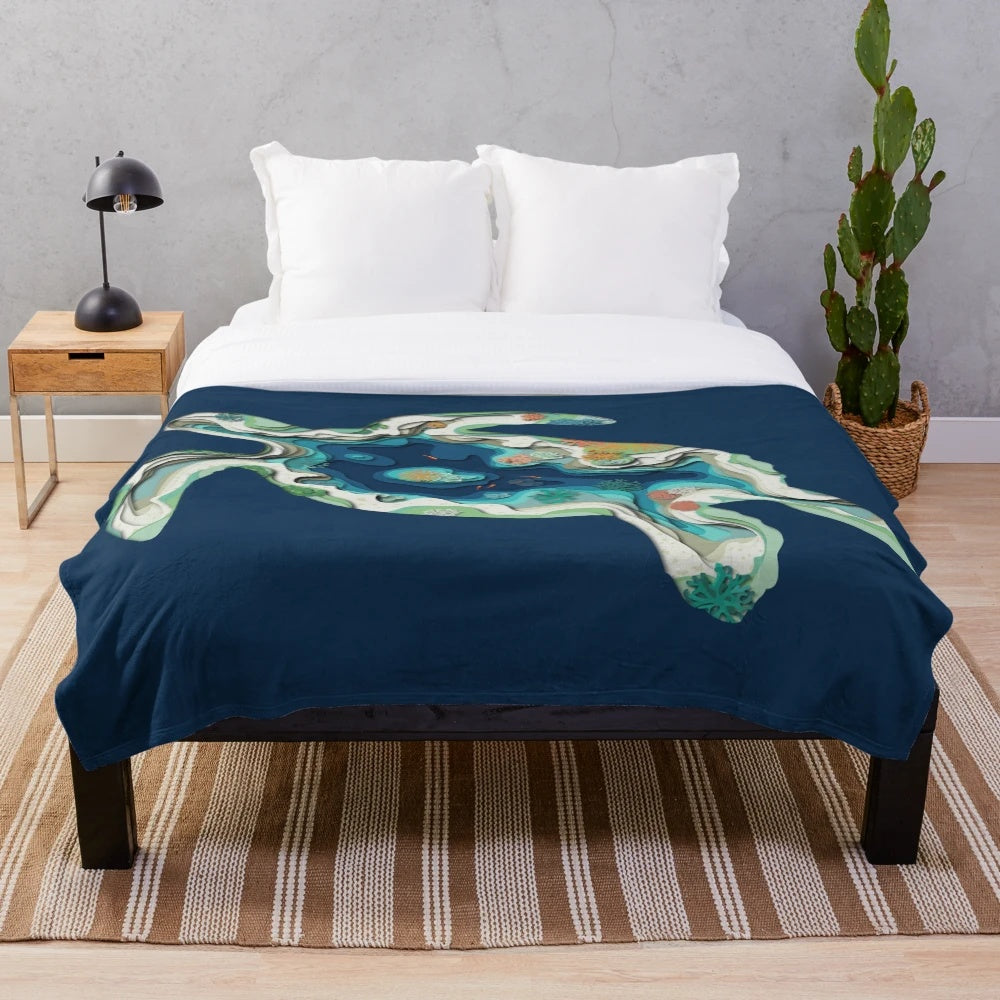 Cozy 3D turtle-shaped plush blanket depicting an underwater world