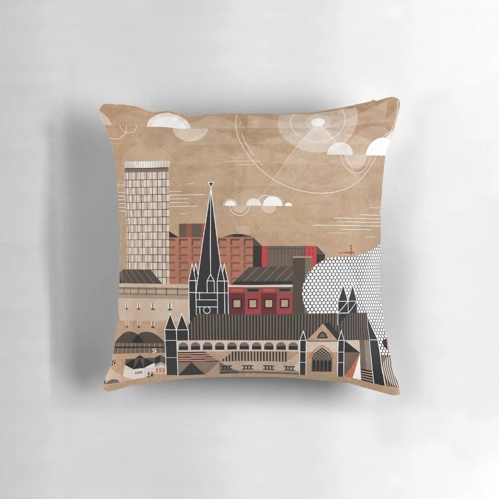 A decorative pillow featuring the iconic skyline and cityscape of Birmingham, UK.