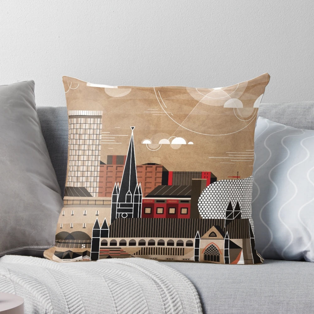 A decorative pillow featuring the iconic skyline and cityscape of Birmingham, UK.