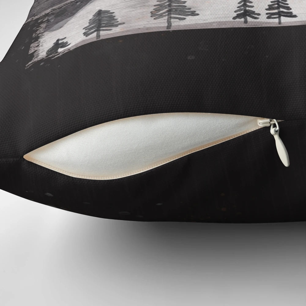 Cozy grey pillow with nature-inspired design featuring mountains, sunset, and wildlife