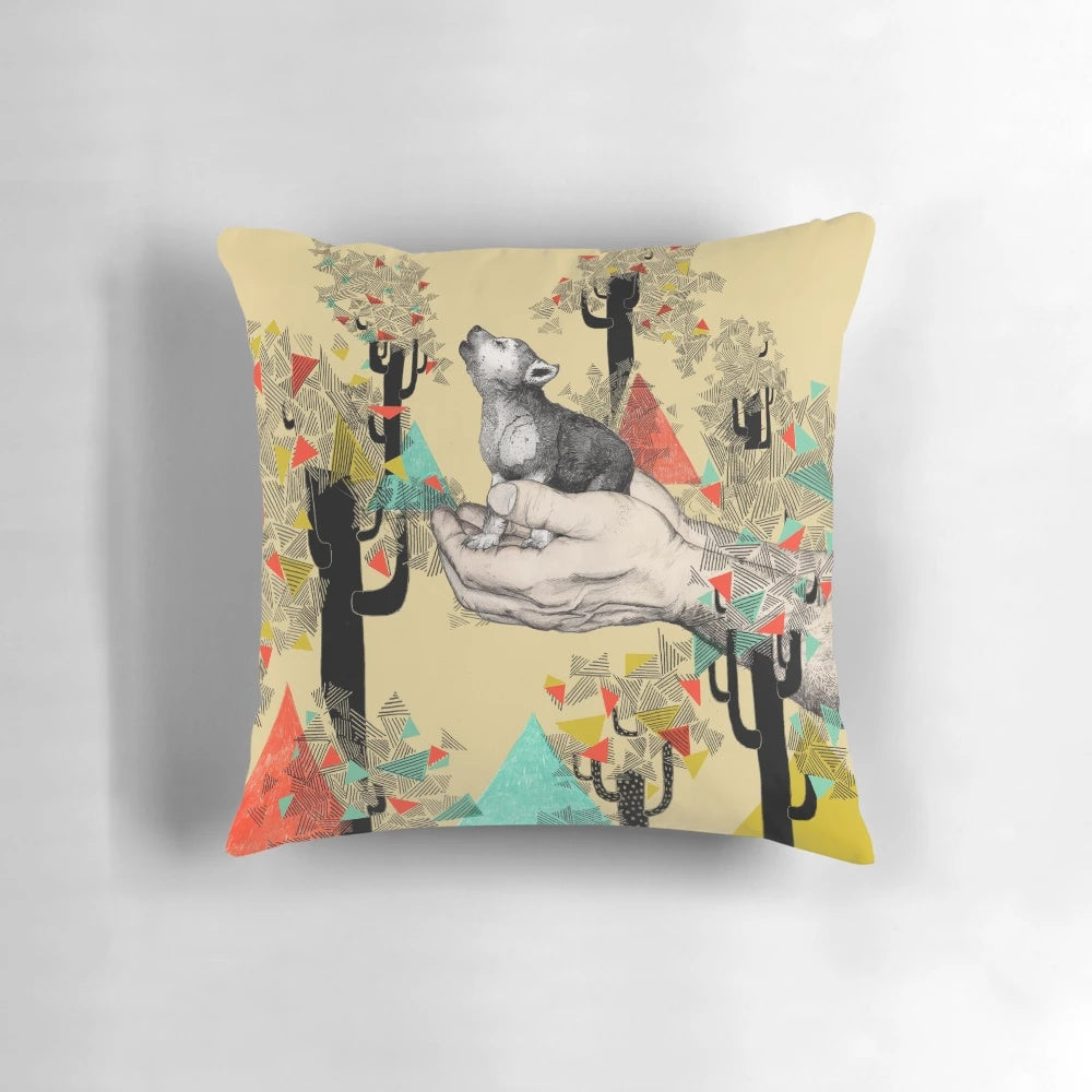 A cozy pillow featuring a whimsical wolf cub design in yellow and mustard tones surrounded by geometric shapes and trees.