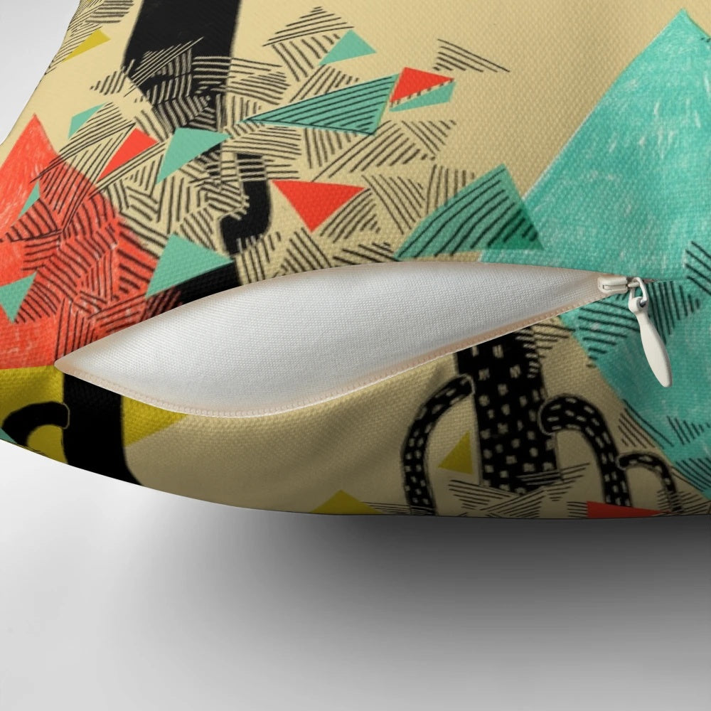 A cozy pillow featuring a whimsical wolf cub design in yellow and mustard tones surrounded by geometric shapes and trees.