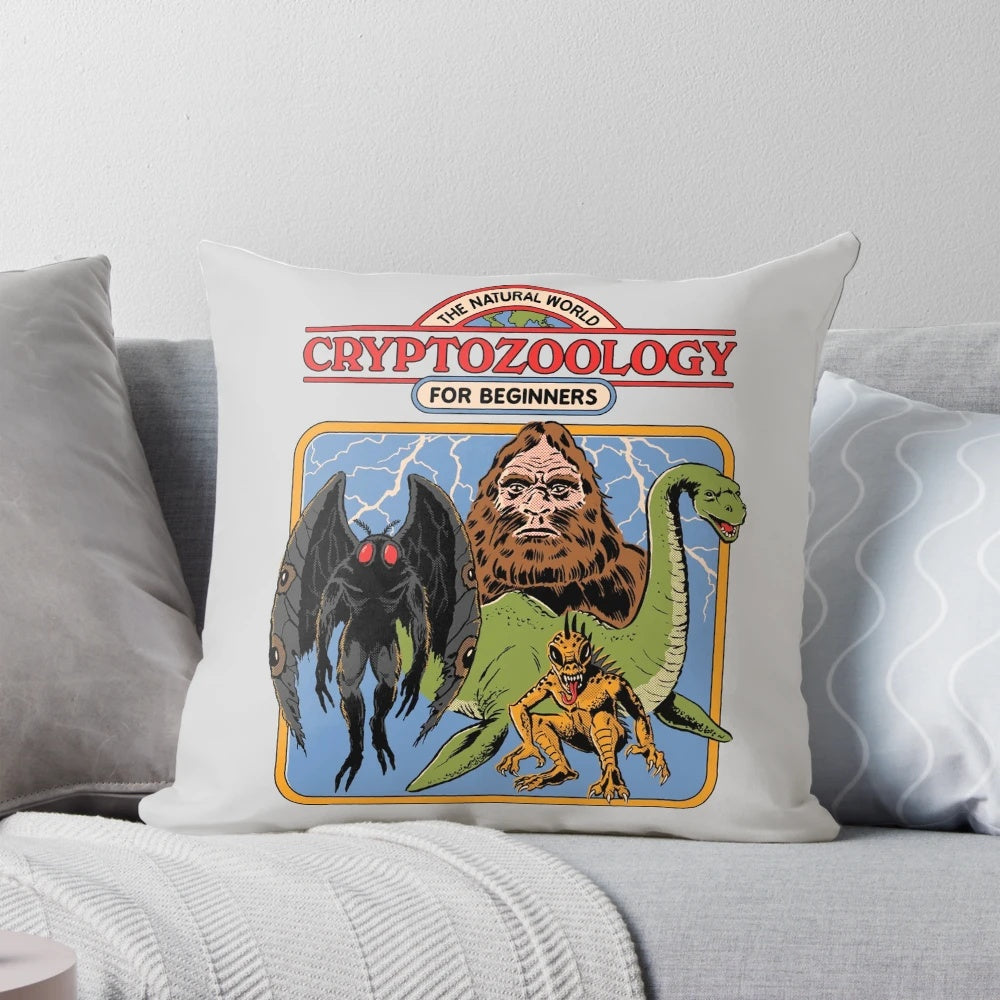 Pillow featuring illustrations of mythological creatures and cryptids like Bigfoot, Loch Ness Monster, and Chupacabra.