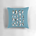 Colorful pillow featuring a group of playful penguins in an Antarctic landscape
