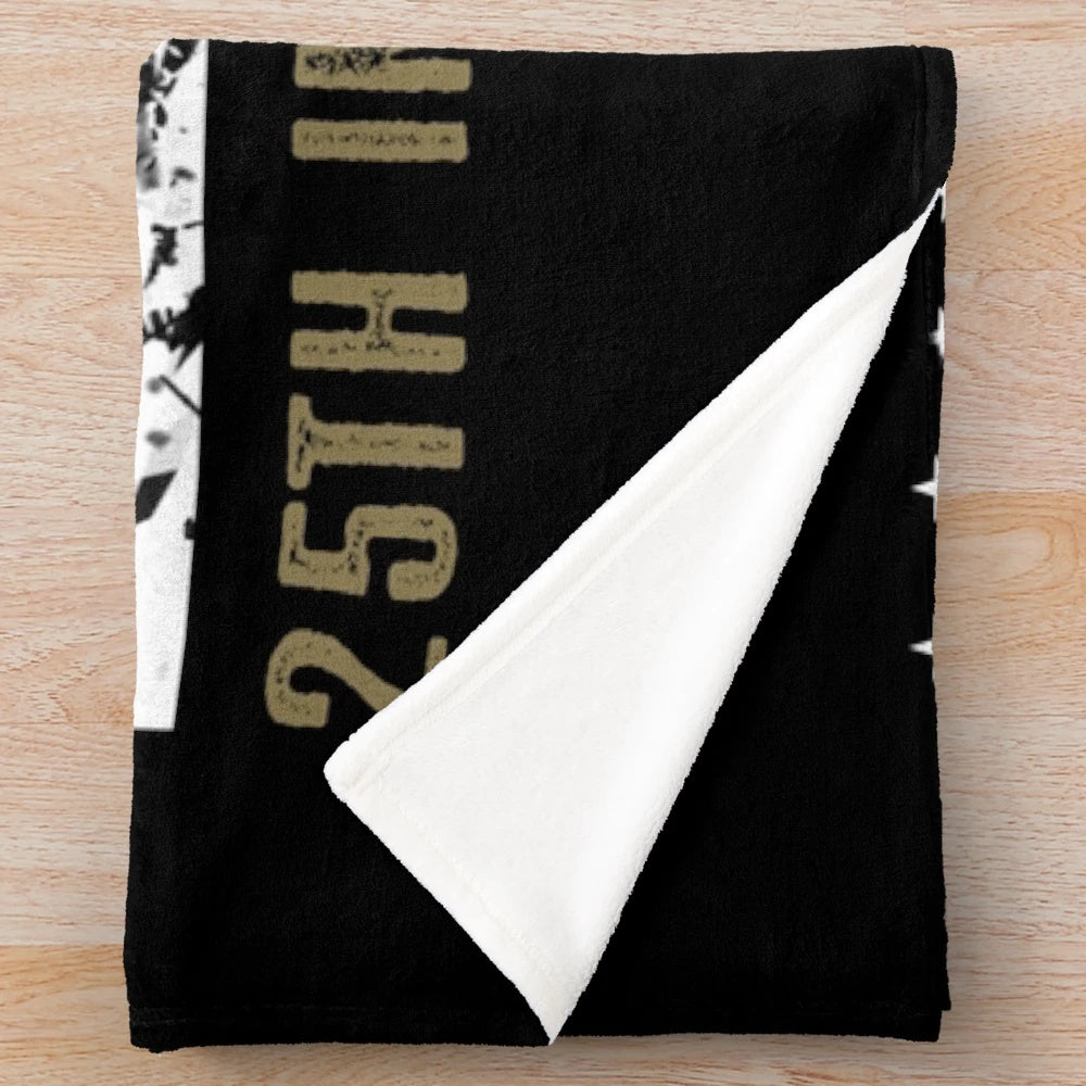 Distressed 25th infantry division plush blanket featuring an American flag design