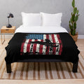 Distressed American flag plush blanket with snowmobiling design