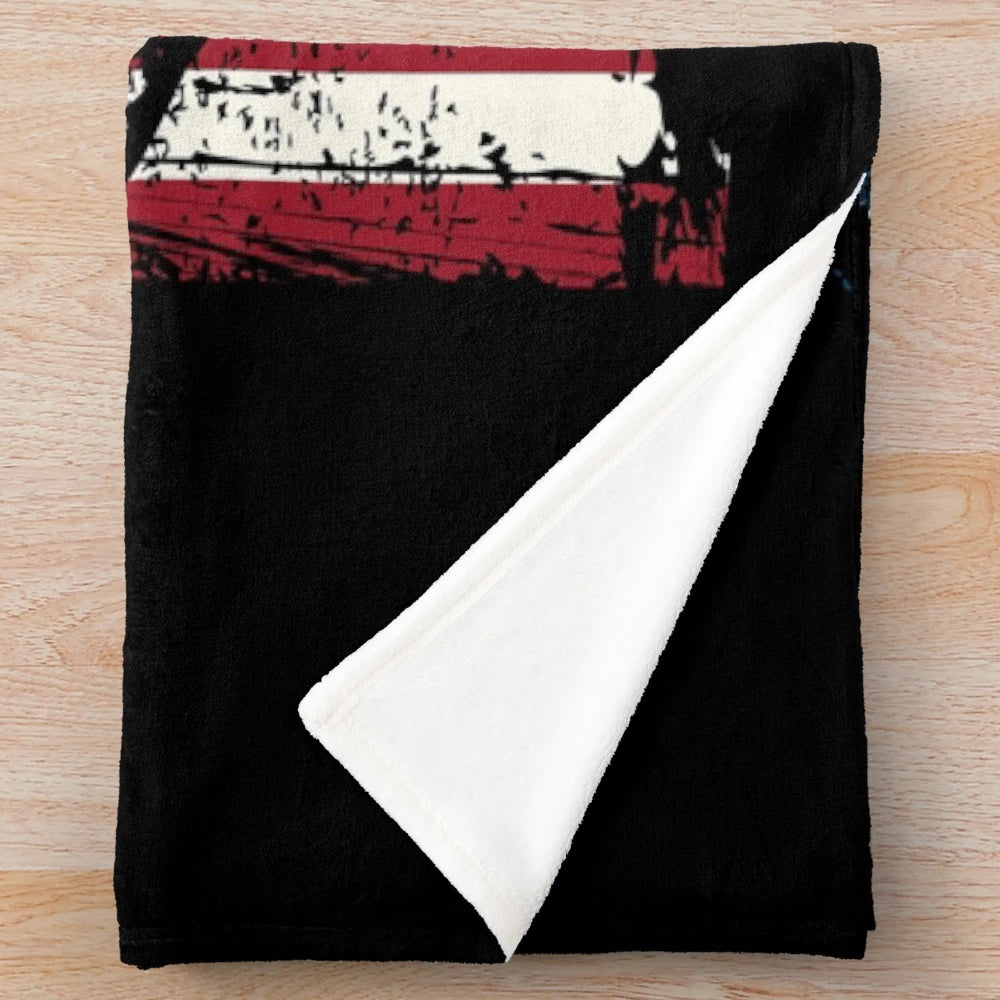 Distressed American flag plush blanket with snowmobiling design