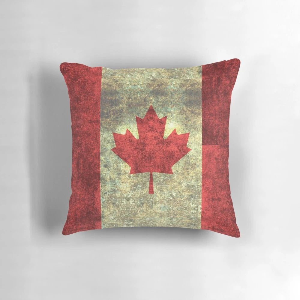 Heavily distressed Canadian flag or maple leaf design printed on a throw pillow