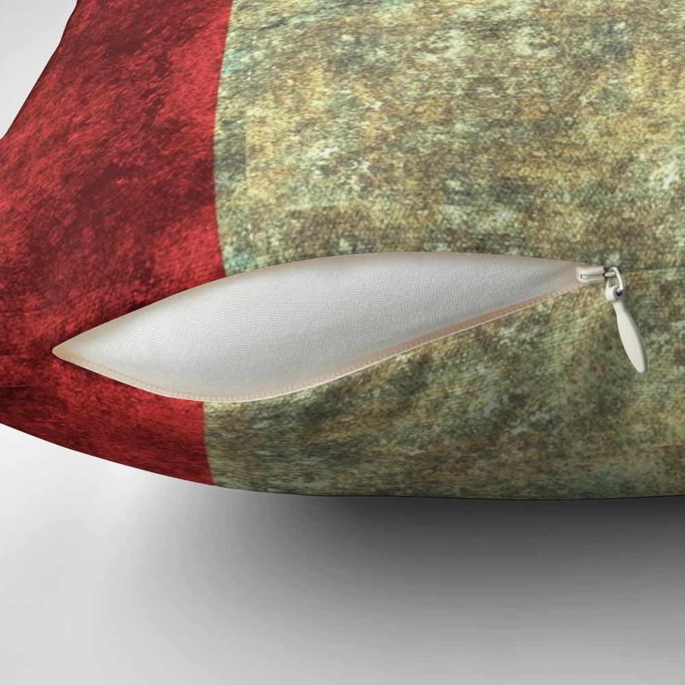 Heavily distressed Canadian flag or maple leaf design printed on a throw pillow
