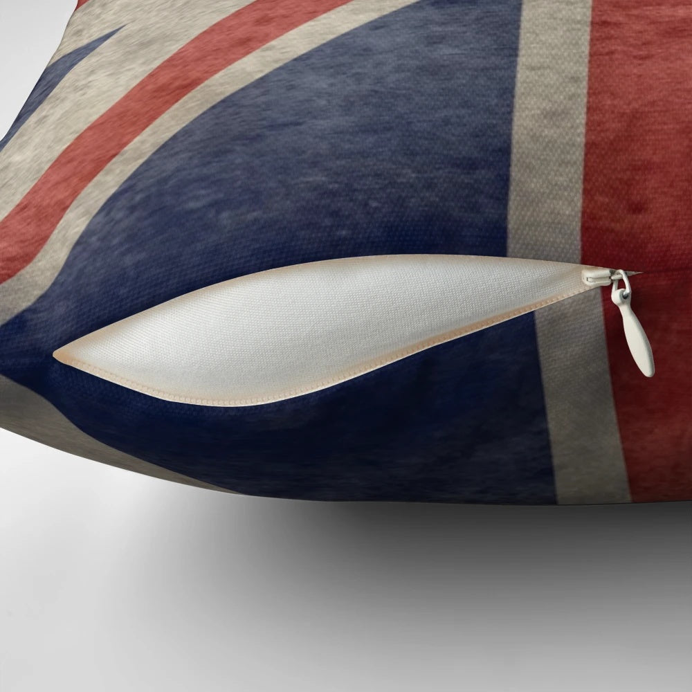 Distressed faded union jack flag design printed on a soft, comfortable pillow