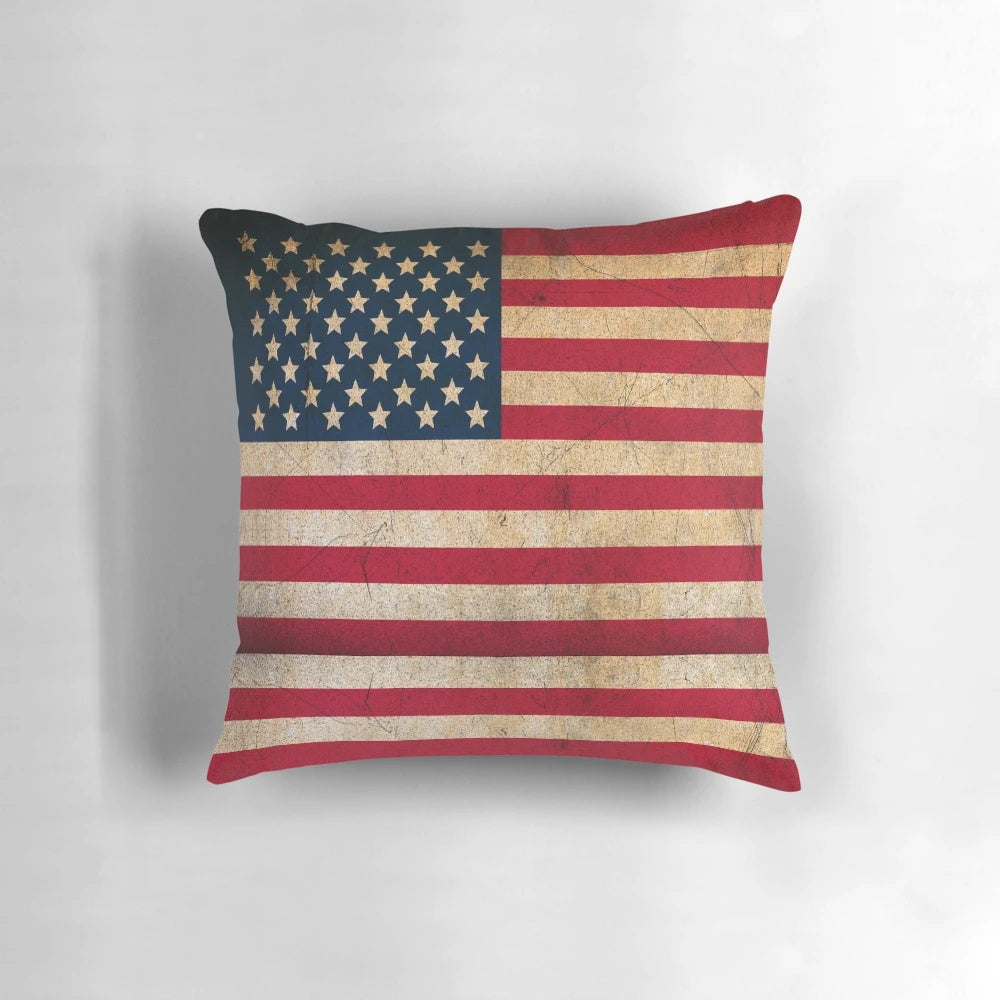 Distressed vintage American flag throw pillow with stars and stripes design