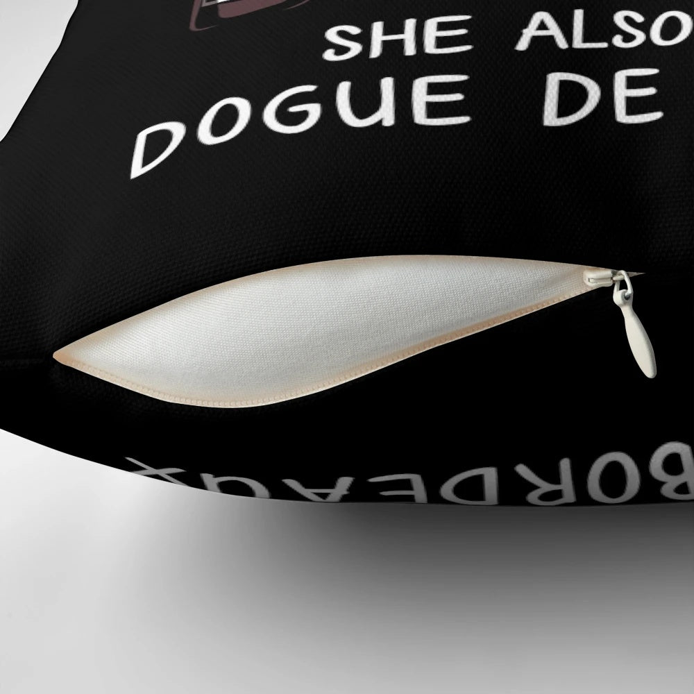 Dogue Bordeaux dog sitting with a glass of wine on a decorative throw pillow