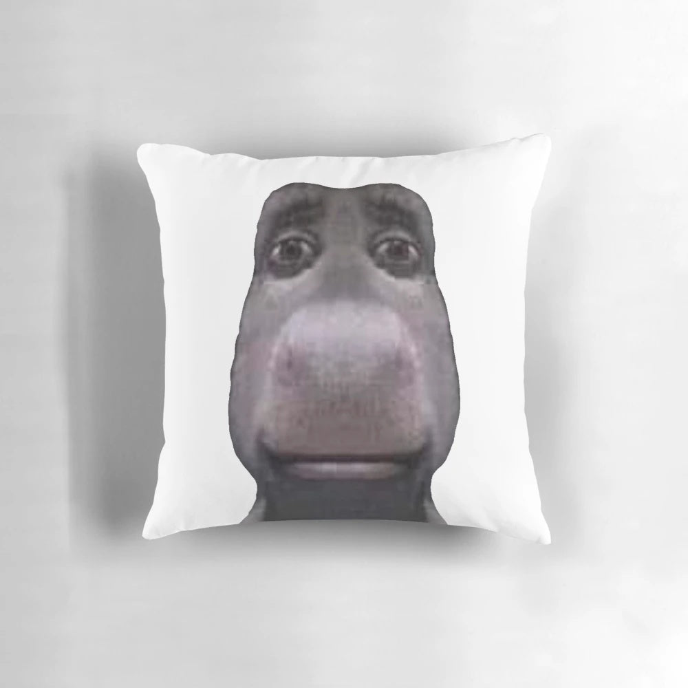 Pillow featuring the iconic donkey character from the Shrek movie franchise, staring into the viewer's soul.