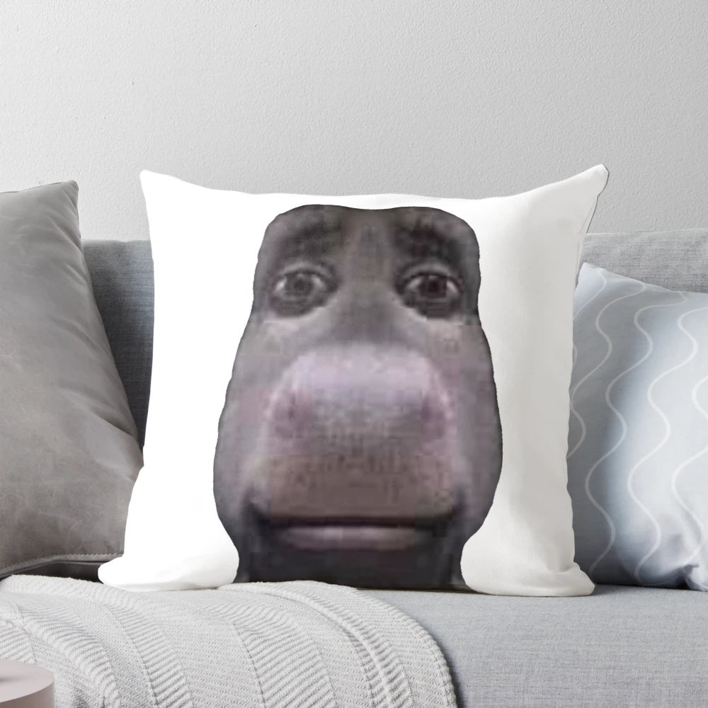 Pillow featuring the iconic donkey character from the Shrek movie franchise, staring into the viewer's soul.