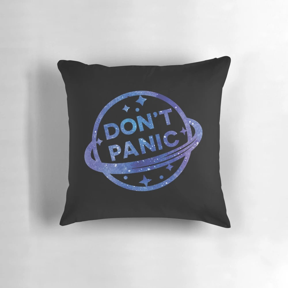 Don't Panic" Retro Sci-Fi Pillow featuring the iconic quote from Douglas Adams' Hitchhiker's Guide to the Galaxy