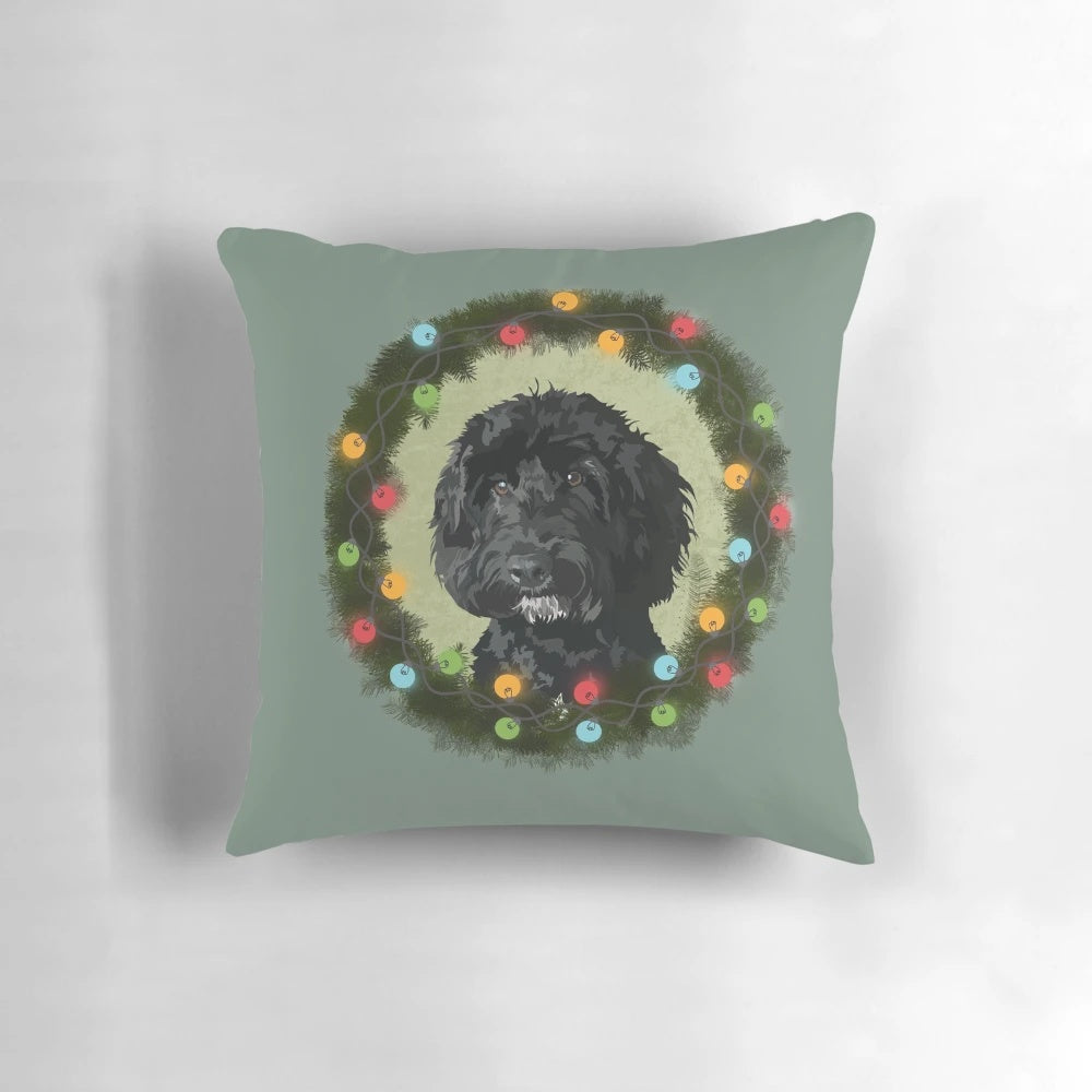 Doodle Christmas pillow with a wreath design and dog silhouettes