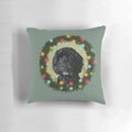 Doodle Christmas pillow with a wreath design and dog silhouettes