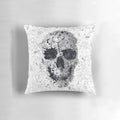 Doodle skull decorative pillow featuring a black and white collage design