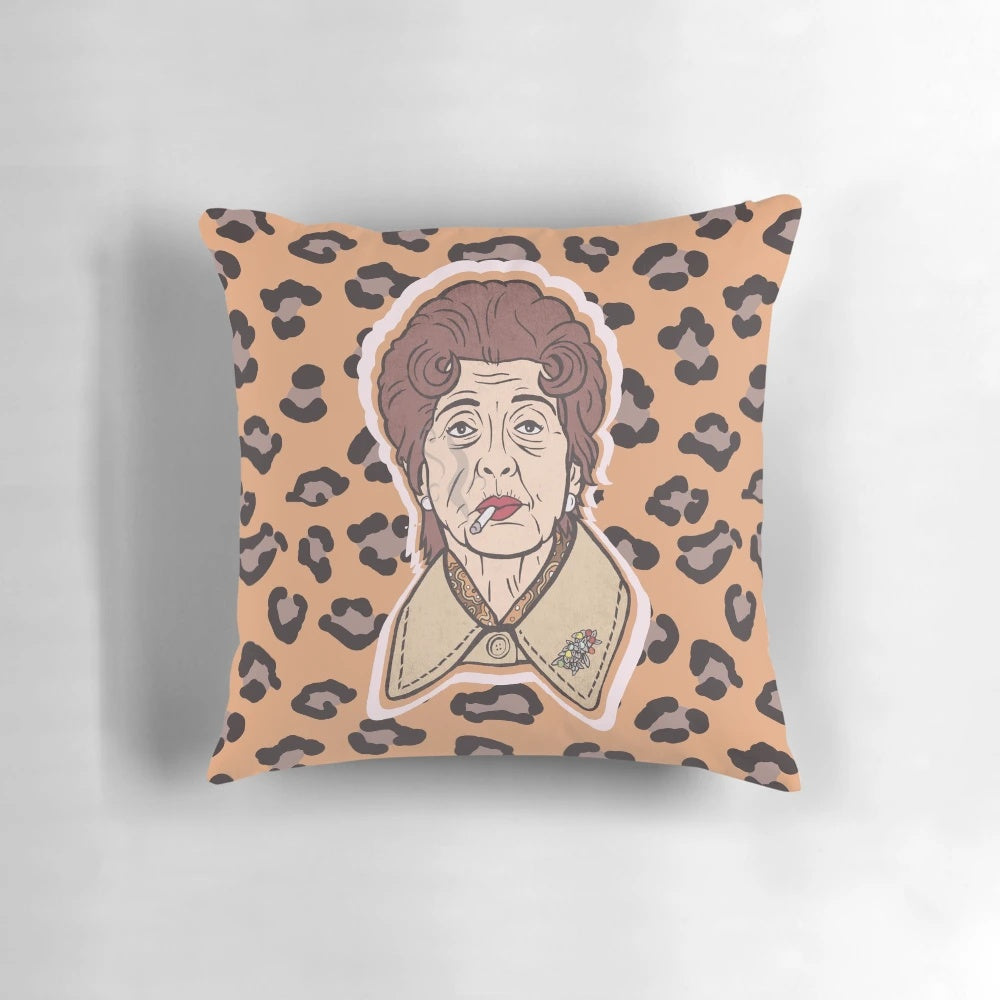 Dotty Cotton inspired decorative pillow featuring a retro, British-themed design