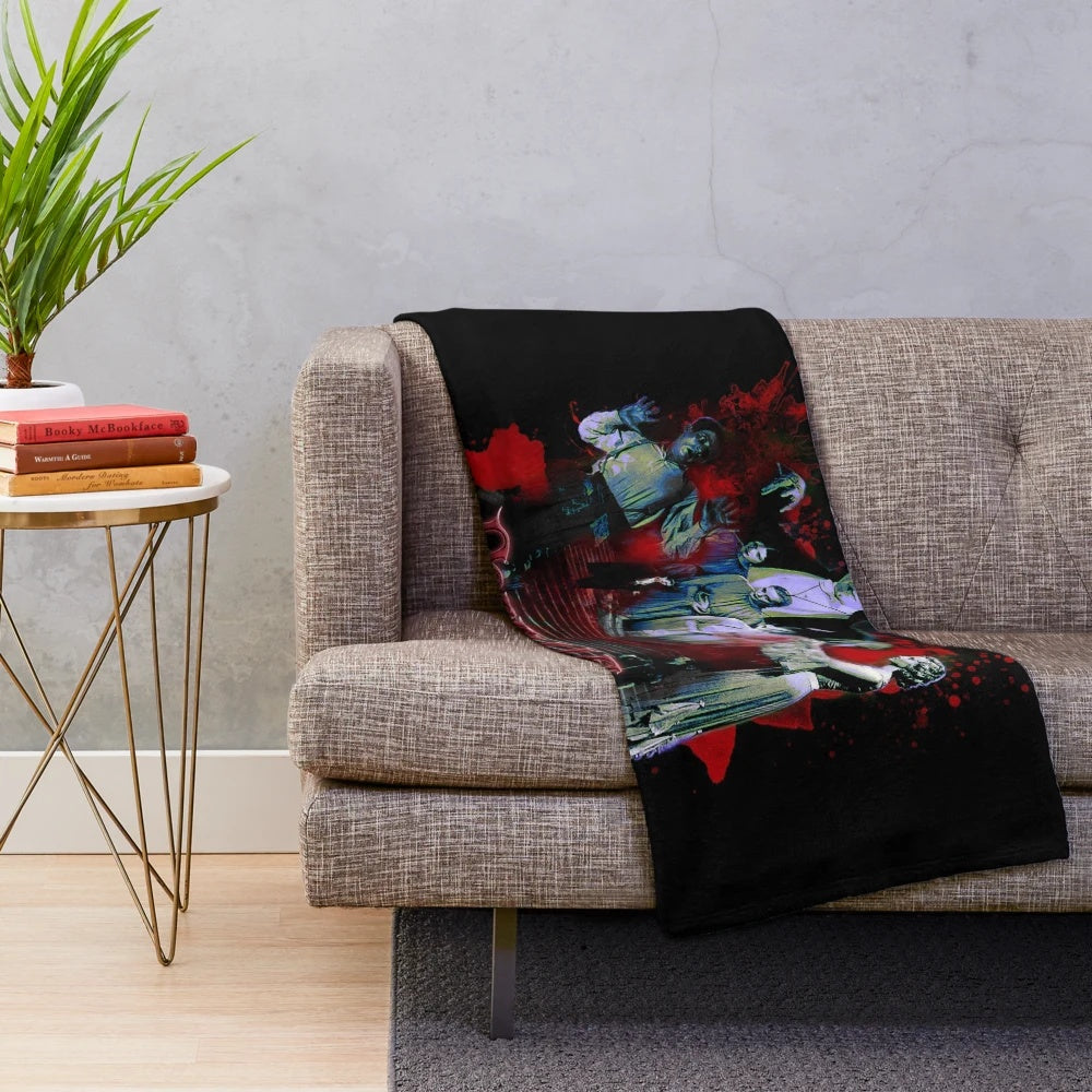 Dracula-inspired plush blanket with classic horror movie imagery