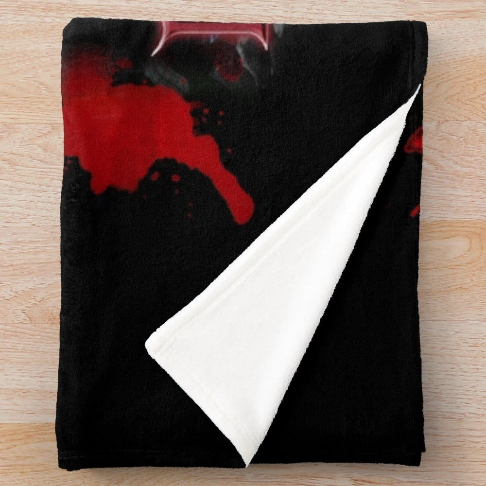 Dracula-inspired plush blanket with classic horror movie imagery