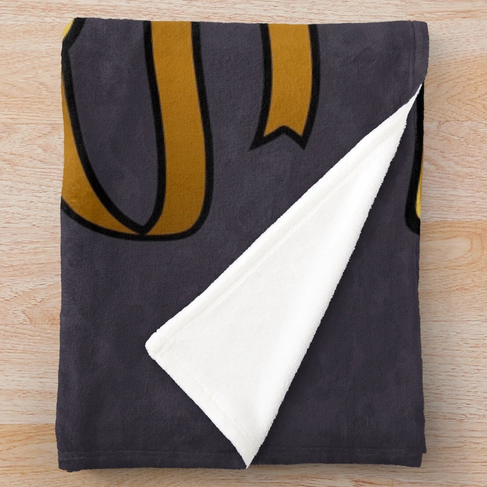 Plush blanket featuring gold comedy and tragedy theater masks