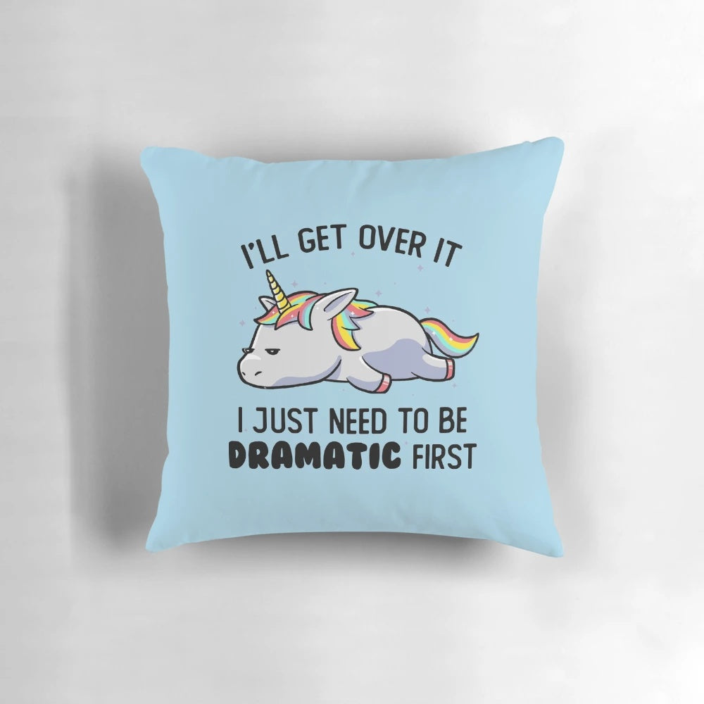 Colorful unicorn-themed pillow with a dramatic, sleepy design