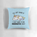 Colorful unicorn-themed pillow with a dramatic, sleepy design