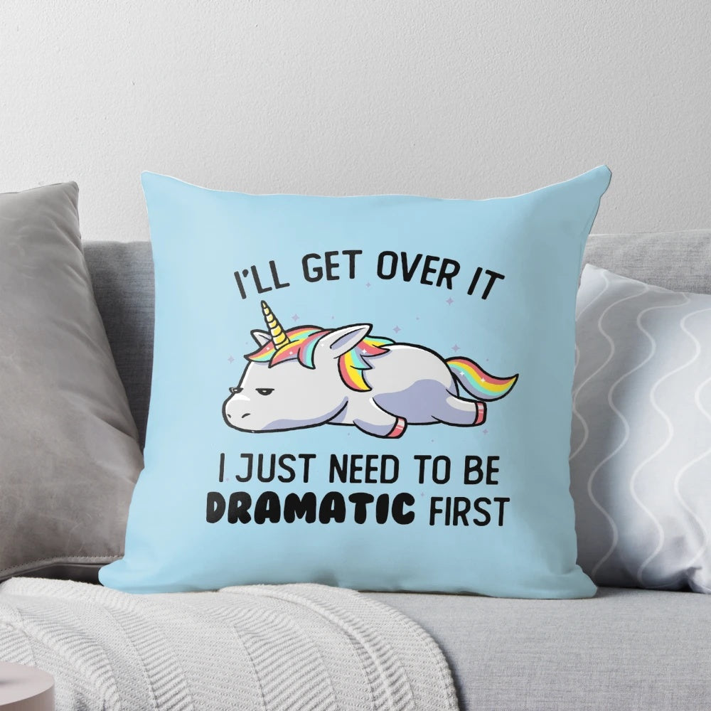 Colorful unicorn-themed pillow with a dramatic, sleepy design