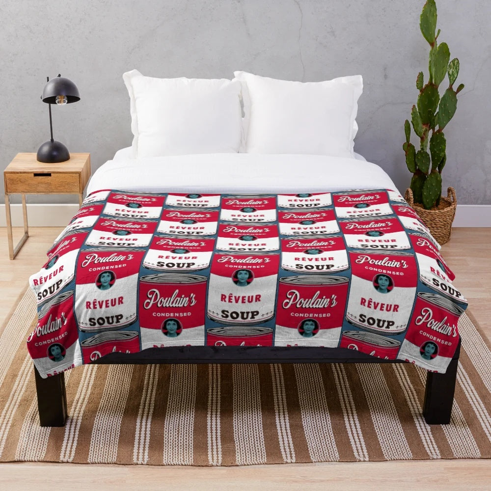 Dreamer-inspired plush blanket featuring the character Poulain from the French film "Amelie" and pop art style Campbells soup can