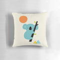 Dreaming koala pillow with geometric, colorful design