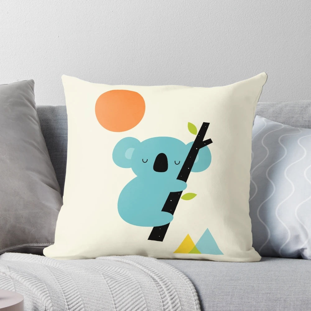 Dreaming koala pillow with geometric, colorful design