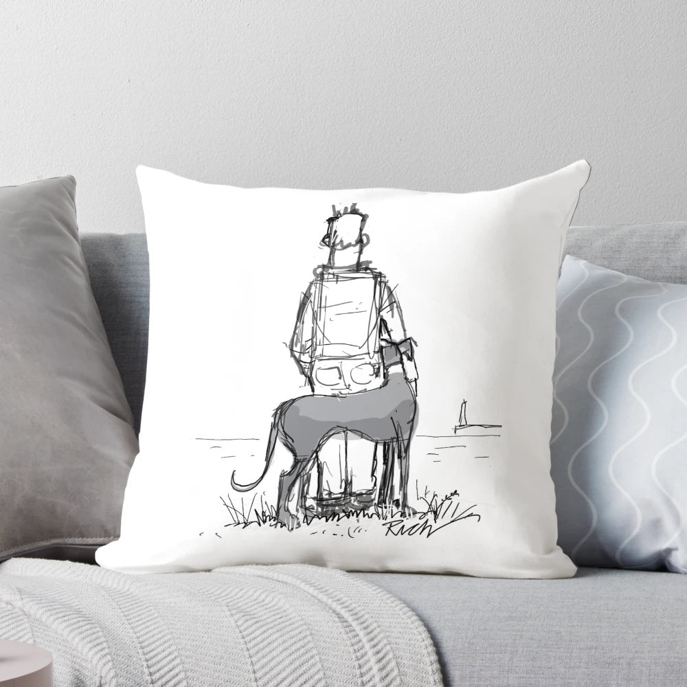 A cozy pillow featuring a greyhound, whippet, or lurcher sighthound dog gazing out at a peaceful coastal seascape.