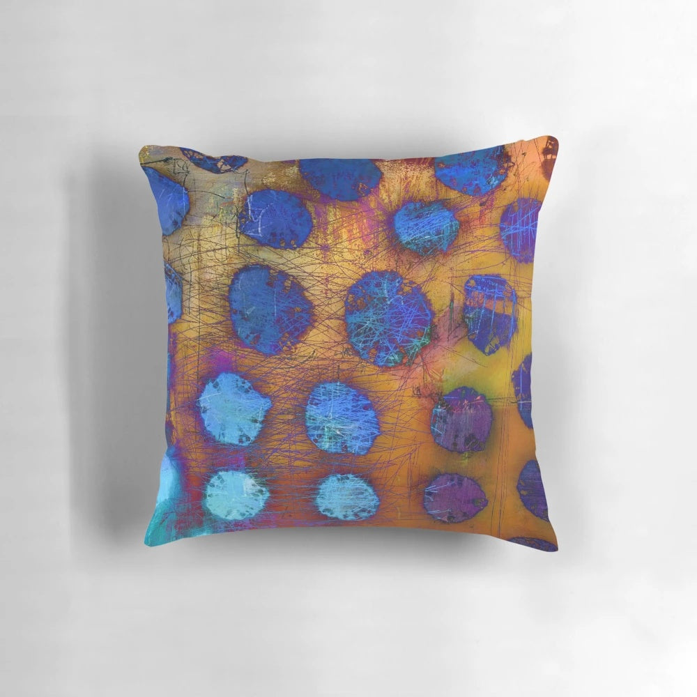 A dark and abstract decorative pillow with bubble-like patterns, perfect for modern home decor.