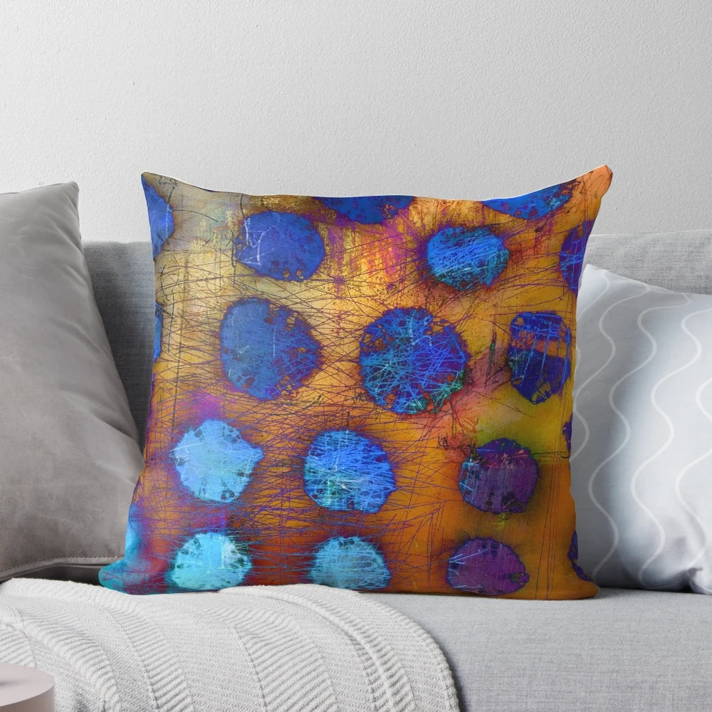 A dark and abstract decorative pillow with bubble-like patterns, perfect for modern home decor.