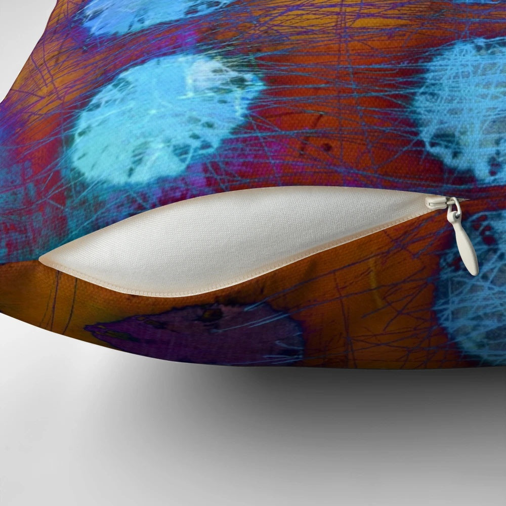 A dark and abstract decorative pillow with bubble-like patterns, perfect for modern home decor.