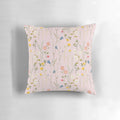 A soft, plush pillow featuring a beautiful floral pattern in vibrant colors, perfect for adding a touch of boho charm to your summer home decor.
