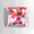 Colorful bubble print pillow with pink, purple, and peach tones