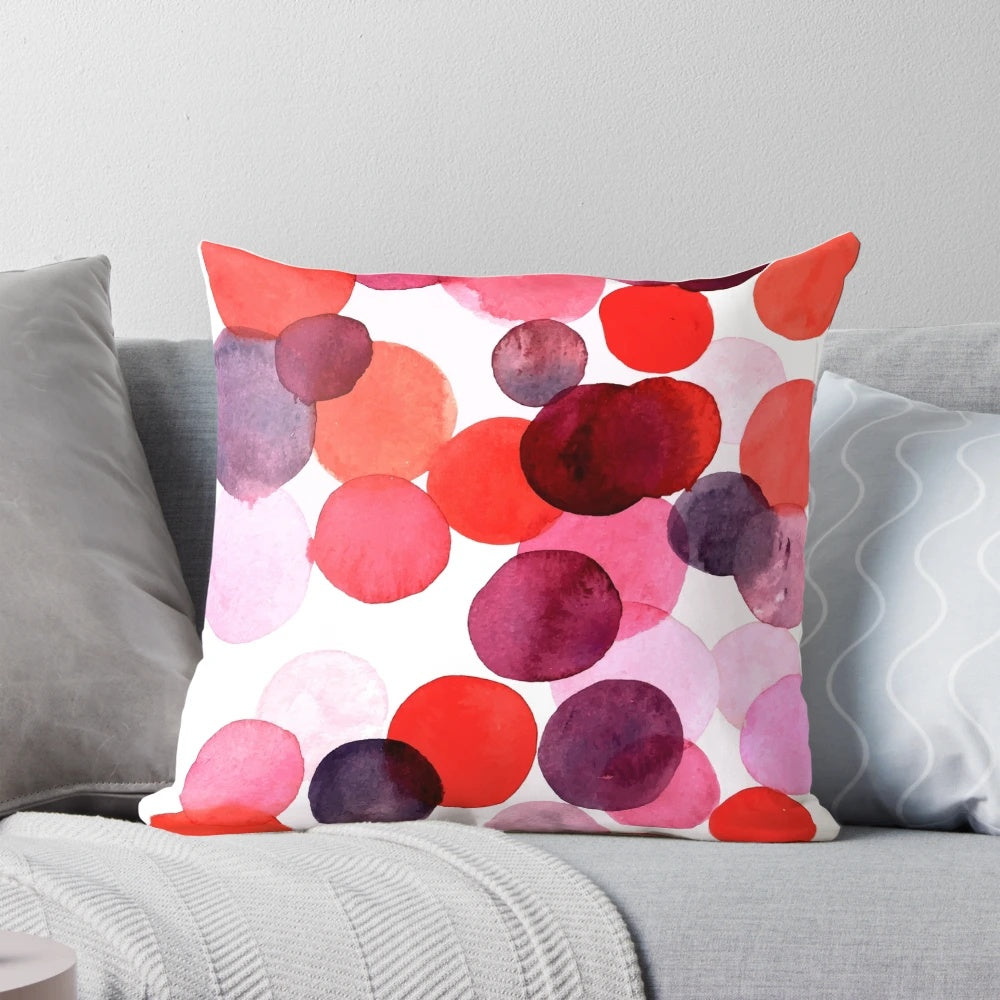 Colorful bubble print pillow with pink, purple, and peach tones